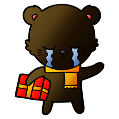 crying cartoon bear with present