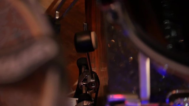 Closeup moving drum bass pedal. Drumming on Stage. Slow motion