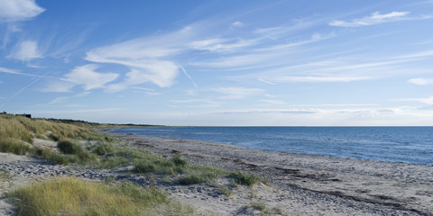 Laesoe / Denmark: View over the empty sand beach of Vesteroe Havn