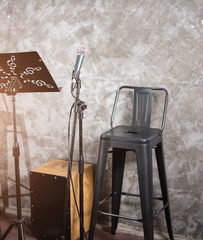 Microphone with chair on stage show