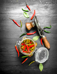 arinated hot chili peppers with seamer.