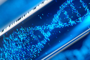 Molecule of DNA forming inside the test tube equipment.3d rendering,conceptual image. © Connect world