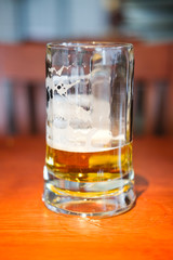Close up of empty beer mug after party