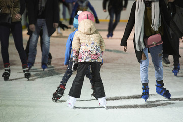 Unidentifiable Ice skaters using a temporary rink during the Christmas and New Year holiday period