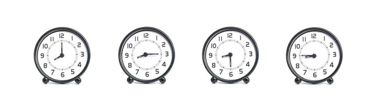 Closeup group of black and white clock for decoration show the time in 8 , 8:15 , 8:30 , 8:45 a.m. isolated on white background