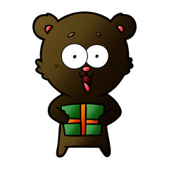 laughing teddy  bear with christmas present