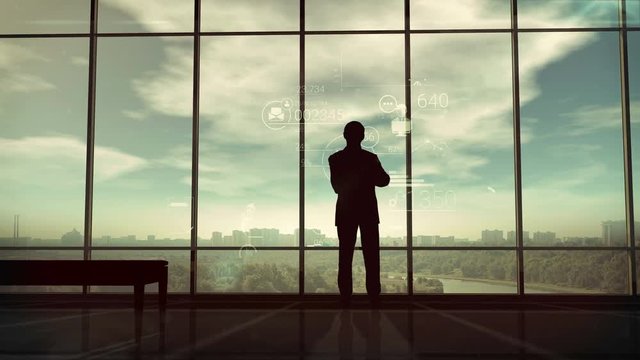 Silhouette of man and corporate infographics