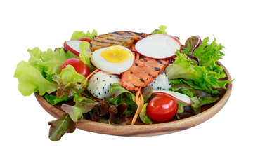 Salad and fresh vegetables isolated on white background