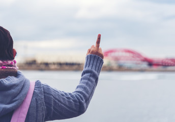Women show up middle finger as anger expression or disagree on something