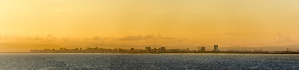 panorama of the skyline of San Juan, Puerto Rico at dawn. - obrazy, fototapety, plakaty