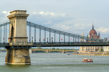 Motorboat under Secheni bridge in Budapest