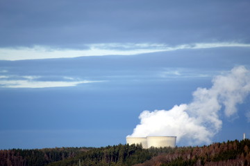 Fototapeta na wymiar A nuclear power station in a forest 