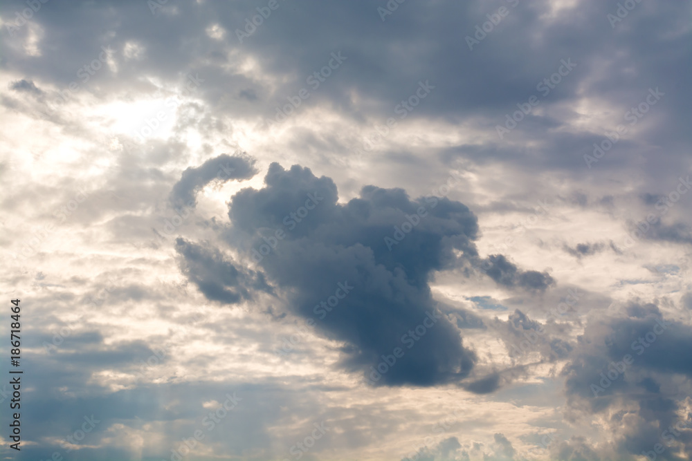 Wall mural gray thunderclouds curly clouds in the dark sky