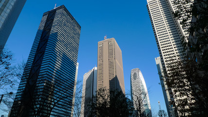 A group of modern skyscrapers in Tokyo city with beautiful sky and clouds.