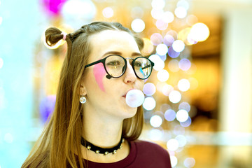 Pink: Girl Blowing Big Bubble with Copyspace