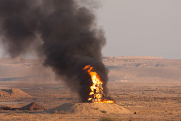 Fire and black smoke of burning oil during a fire power demonstartion of the Israeli Defence Forces...