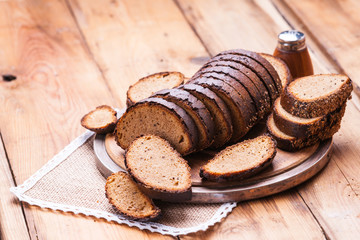 Sliced rye bread on a cutting board