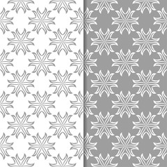 White and gray set of floral backgrounds. Seamless patterns