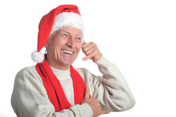 senior man in Santa hat