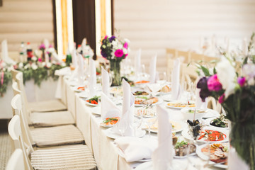 Interior of a restaurant prepared for wedding ceremony