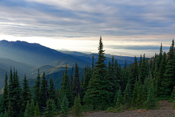 Sun setting behind the Olympic Mountains