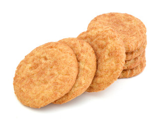 Stack of snickerdoodles over white.