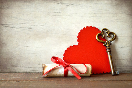 Valentines Day creative composition. Heart shape decoration, vintage key and love letter. Love concept.