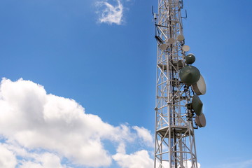 Transmitters and aerials on telecommunication tower, wireless communication concept