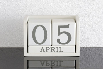 White block calendar present date 5 and month April