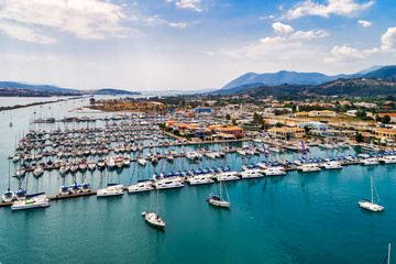 Sailboats in the marina and the city of Lefkada island, Greece