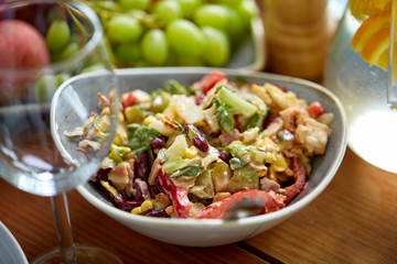 smoked chicken salad in bowl on wooden table