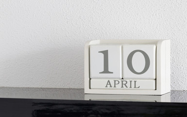 White block calendar present date 10 and month April