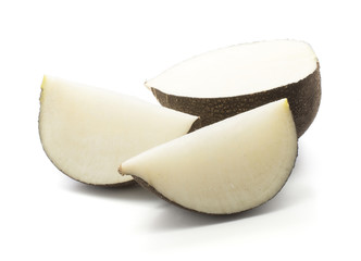 Sliced black radish one half and two slices isolated on white background.