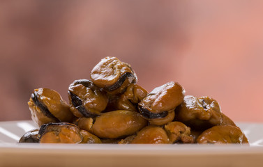 Mussels on a plate from a side view