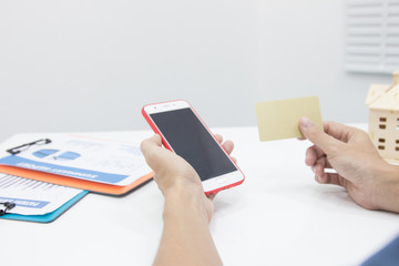 Business man hand working with notepad on workplace in office, Search Engine Optimization, lifestyle man and technology communication