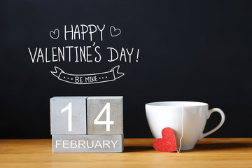 Valentines Day message with coffee cup with wooden blocks