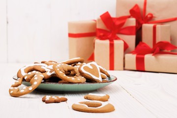 Ginger biscuits on the background of gifts