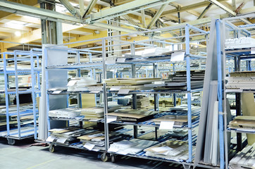 Warehouse of particle boards or chipboards materail for support the furniture manufacturers. Production room.