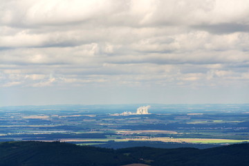 Cooling towers with steam vapour from Temelin nuclear power station in Czech Republic on cloudy...