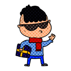 Obraz premium cartoon boy wearing sunglasses carrying xmas gift