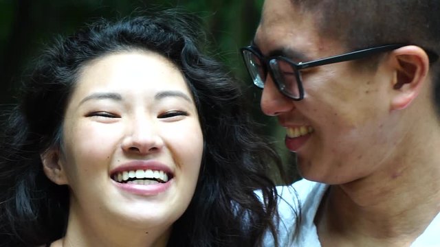 Portrait of Asian Couple Smiling