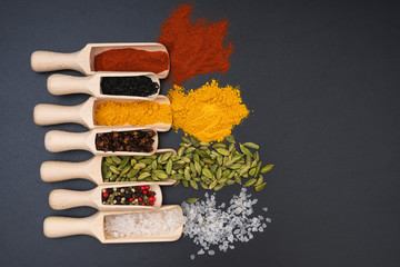 Different exotic spices on a black background