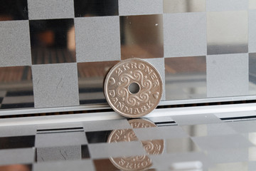 Denmark coins denomination is 2 krone (crown) in mirror reflect wallet