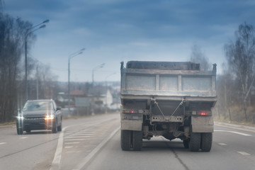 dump truck on a muddy road