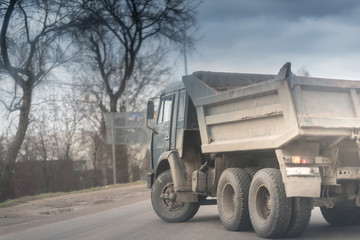 dump truck on a muddy road
