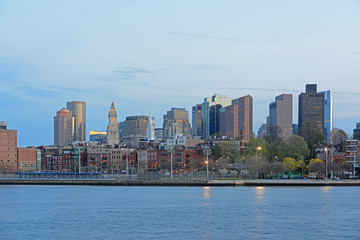 Fototapeta na wymiar Boston City Skyscrapers, Custom House and Boston Waterfront at twilight from East Boston, Boston, Massachusetts, USA.