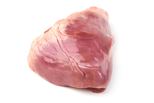 Raw pork heart, isolated on white background.