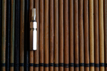 Head for screwdriver (bits) on wooden background, Tools collection turn-screw