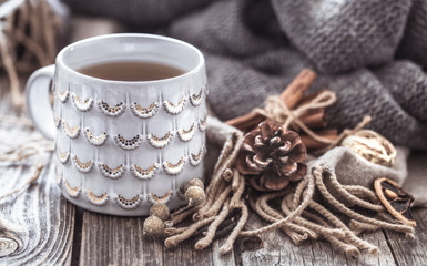 cozy cup of tea on a wooden background