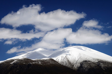 View of Olympos mountain covered with snow, taken from the village Olympiada. Municipality of Elassona, Larissa prefecture, Thessaly region, Greece.